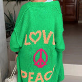 Blossom | Sweter „Miłość i Pokój” – miękki, oversize’owy, modny design